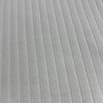 Close-up of light gray ribbed fabric texture, ideal for clothing and fashion design, showing fine vertical lines and soft material.