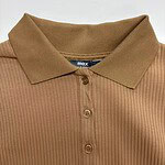 Close-up of a men's ribbed polo shirt in tan color with a classic collar and button placket, perfect for casual or smart-casual outfits.