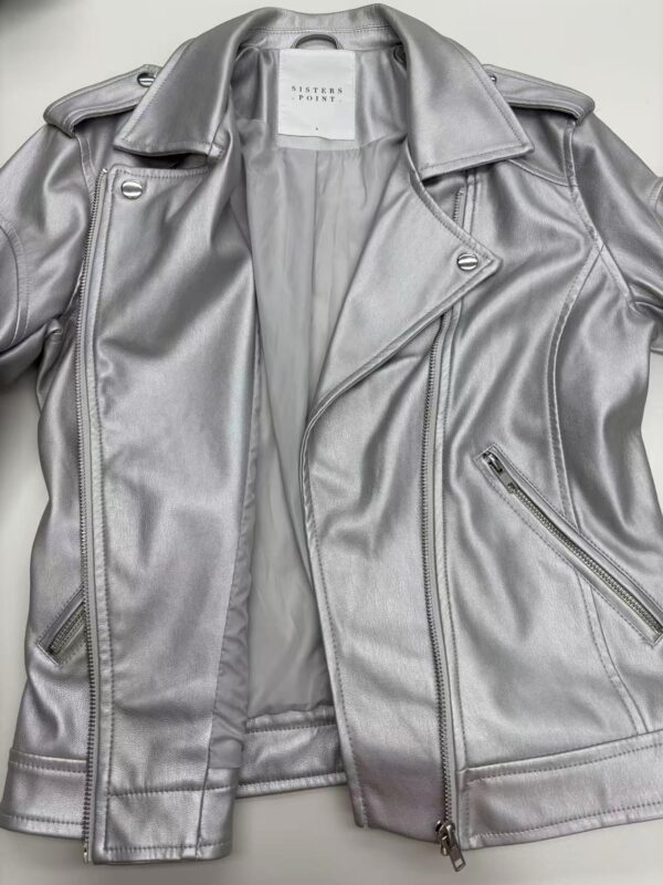 Elegant silver leather jacket with zipper details, shoulder epaulets, and classic lapel collar, perfect for fashion-forward women.