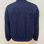 Men's navy blue knitted sweater with textured pattern, suitable for casual and semi-formal wear, displayed on a mannequin against a plain background.