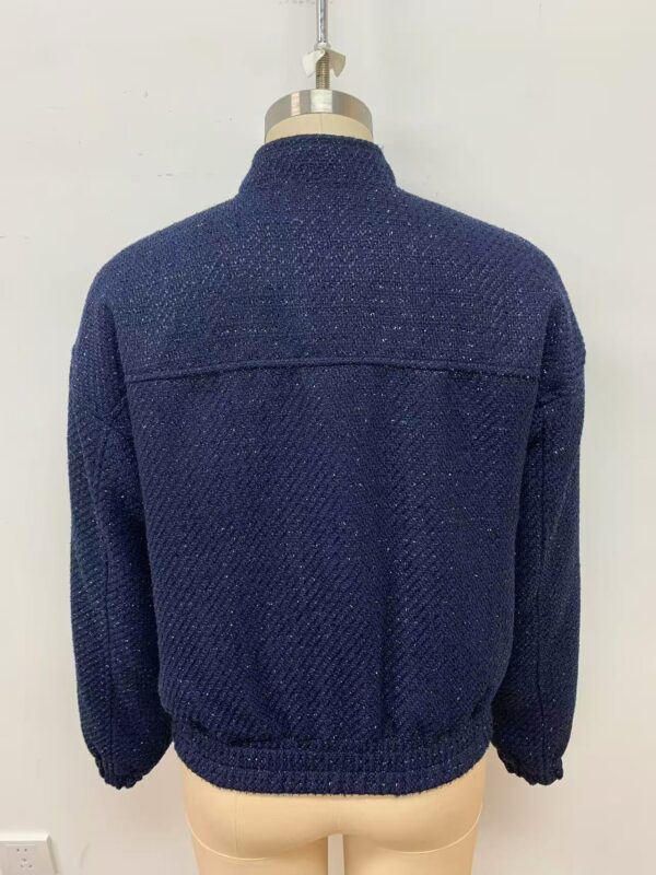Men's navy blue knitted sweater with textured pattern, suitable for casual and semi-formal wear, displayed on a mannequin against a plain background.
