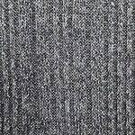 Close-up of a textured gray and black knitted fabric, showcasing intricate pattern and fine craftsmanship, ideal for stylish clothing and accessories.